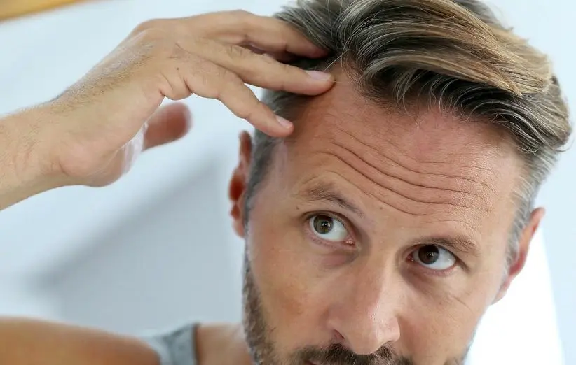 ریزش موهایتان را به این روش درمان کنید