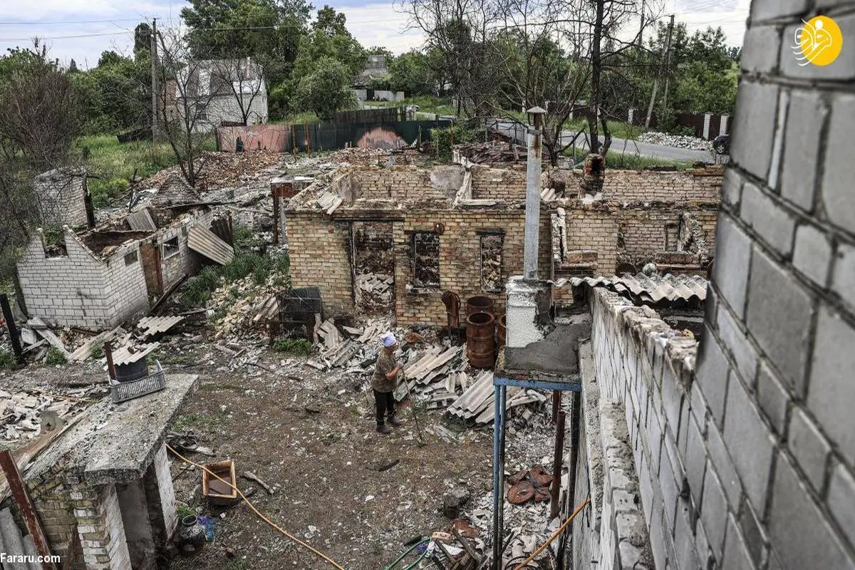 زن اوکراینی خانه ویران شده خود را ترک نمی‌کند +تصاویر
